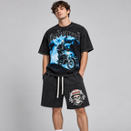 Male model wearing the two-piece Godspeed Skeleton Rider T-Shirt and Skull Rider Shorts set